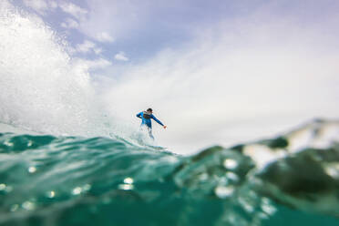 Man Surfing In Sea Against Sky - EYF00258