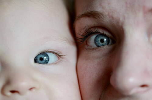 Extreme Close-Up Portrait Of Mother And Son - EYF00313