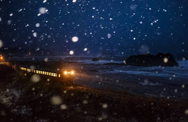 High Angle View Of Train Moving During Snowstorm - EYF00383