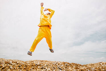 Man Jumping On Hill - EYF00474