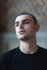 Close-Up Of Thoughtful Young Man Looking Away - EYF00482