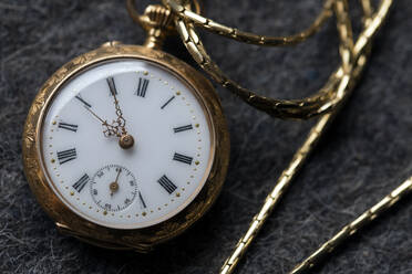 Close-Up Of Pocket Watch On Table - EYF00699