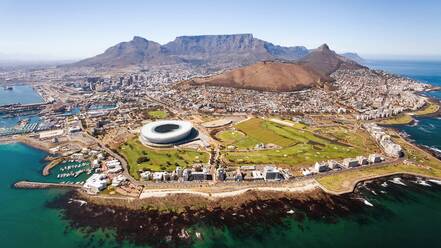 Aerial View Of Cape Town Stadium Amidst Sea And Mountains In City - EYF00863