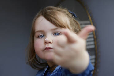 Portrait of toddler girl with cream on her nose - AUF00139