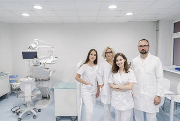 Group of dentists standing in clinic - AHSF02060