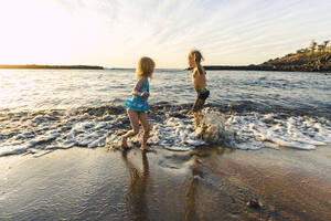 Children playing at the seafront, Adeje, Tenerife, Canarian Islands, Spain - IHF00273