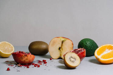 Close-Up Of Fruits On Table Against Gray Background - EYF01056