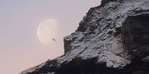 Moon setting behind snow covered mountains, Iceland, Polar Regions - RHPLF14289