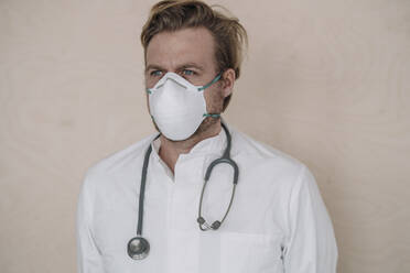 Portrait of doctor wearing protective mask - JOSEF00103