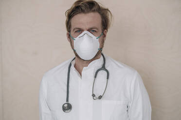 Portrait of doctor wearing protective mask - JOSEF00104