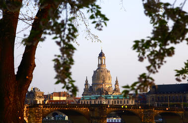 Germany, Saxony, Dresden, Arch bridge and Dresden Frauenkirche at dusk - JTF01478