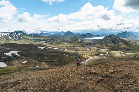 Backpacker Immersed in Alftavatn Valley stock photo