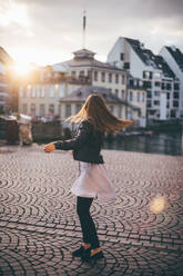 Young Woman Standing On Street In City - EYF01335