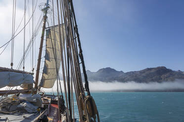 Sailboat on sunny Atlantic Ocean Greenland - HOXF05417