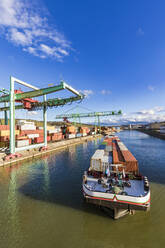 Germany, Baden-Wurttemberg, Stuttgart, Container ship at commercial dock on bank of Neckar river - WDF05870