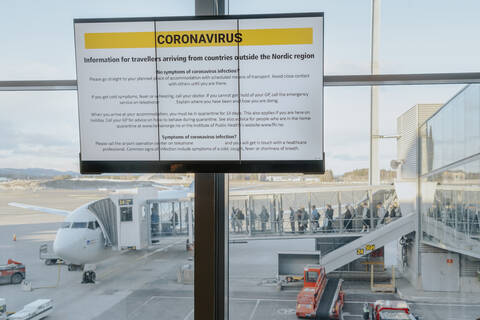 Information sign with safety regulations regarding coronavirus at Oslo airport, Norway stock photo