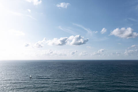 Spain, Biscay, Bilbao, Aerial view of clear line of horizon over Atlantic Ocean on sunny day stock photo