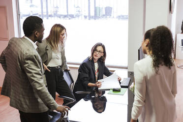 Colleagues having a meeting in office - LJF01447