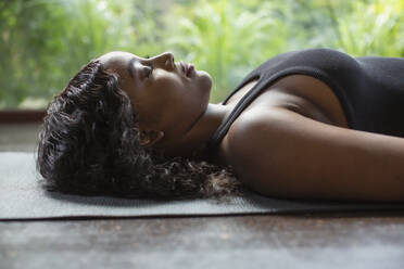 590+ African Woman Lying On A Yoga Mat Stock Photos, Pictures &  Royalty-Free Images - iStock