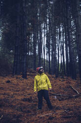 Man standing in forest, Spain - RSGF00246