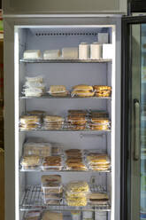 Sealed food in fridge in a small food store - AFVF05878