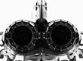 Monochrome detail of afterburners on military jet aircraft - CAVF77754
