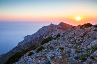 Sunset over mountains near Kamares village on Sifnos island, Greece. - CAVF77895