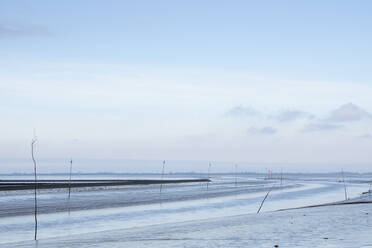 Germany, Schleswig-Holstein, Husum, Sky over Wadden Sea coast at low tide - WIF04210