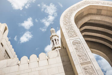 Oman, Muscat, Low angle view of exterior archway of Sultan Qaboos Grand Mosque - AUF00164