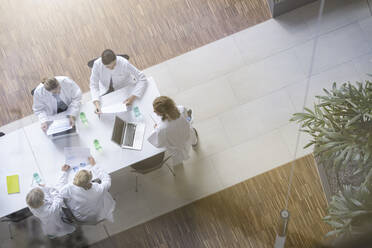 Female doctors having a meeting in conference room - BMOF00373