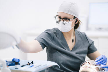 Portrait of dentist at work - DGOF00611