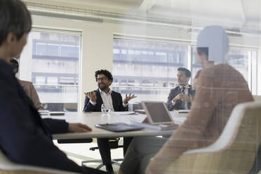 Businessman talking in conference room meeting - CAIF25004