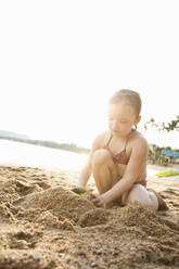 Girl building sandcastle on the beach, Koh Samui, Thailand - AUF00261