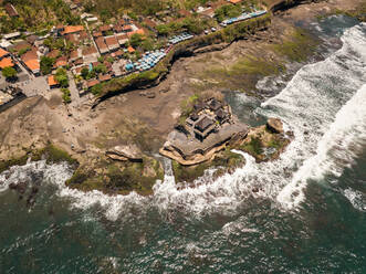 Aerial view of the Tanah Lot Temple in Tabanan Regency, Bali, Indonesia. - AAEF07534