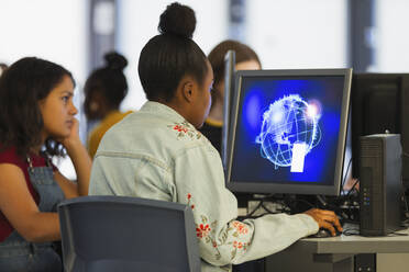 Junior high girl student using computer in computer lab - CAIF25307