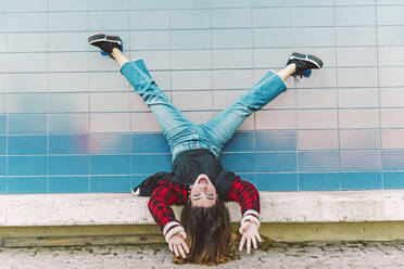 Portrait of teenage girl having fun outdoors - ERRF02968