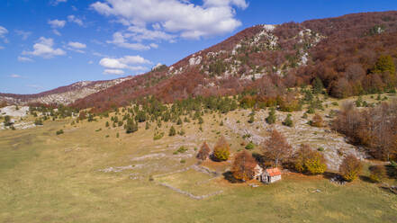 Aerial view of Dinara mountain autumn landscape. Dinara is the highest mountain of Croatia situated near the city of Knin i Dalmatia, Croatia. - AAEF07846