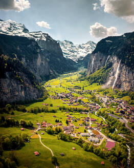 Aerial view of Lauterbrunnen, Interlaken-Oberhasli,Canton of Bern, Switzerland with a view on the valley, mountains and waterfalls - AAEF07896