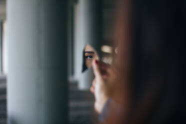 Cropped Image Of Woman Reflecting In Broken Glass - EYF02095