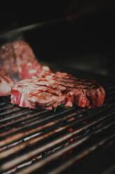 Close-Up Of Meat On Barbecue Grill - EYF02189