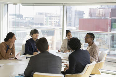 Business people talking in conference room meeting - CAIF25632