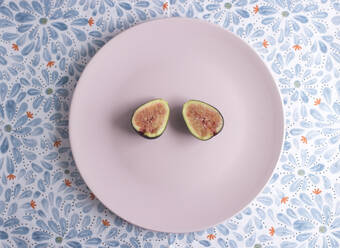 High Angle View Of Figs In Plate On Table - EYF02588