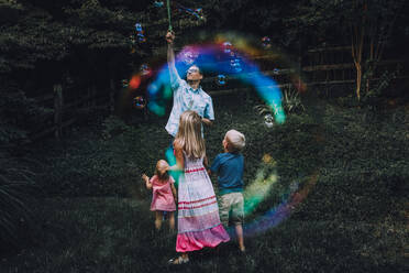 Father Playing With Children At Park - EYF02856