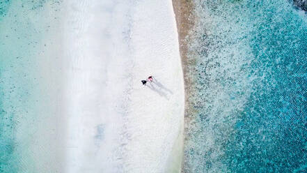 Aerial View Of Couple Walking At Beach - EYF02914