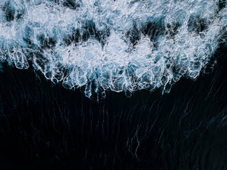 Close-Up Of Frozen Sea Against Black Background - EYF03066