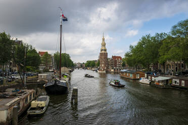 The Netherlands, North Holland Province, Amsterdam, Montelbaanstoren tower on Oudeschans - LBF03023