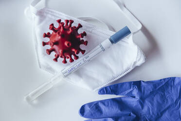 Model of corona virus with test kit on medical mask - MFF05379