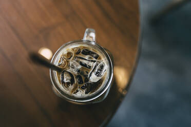 High Angle View Of Iced Coffee On Table - EYF03598