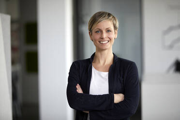 Portrait of a confident businesswoman in office - RBF07400