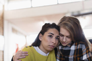 Young woman consoling friend - CAIF26067